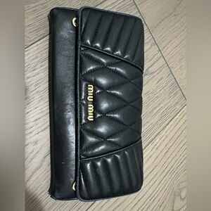 MiuMiu black quilted wallet